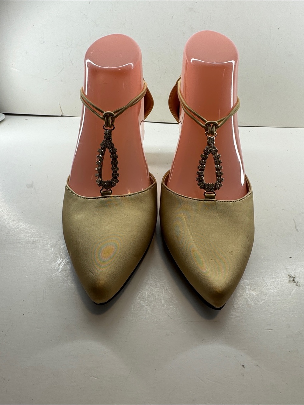 Pointed-Toe Gold T-Strap Heels with Jewel Teardrop Accent